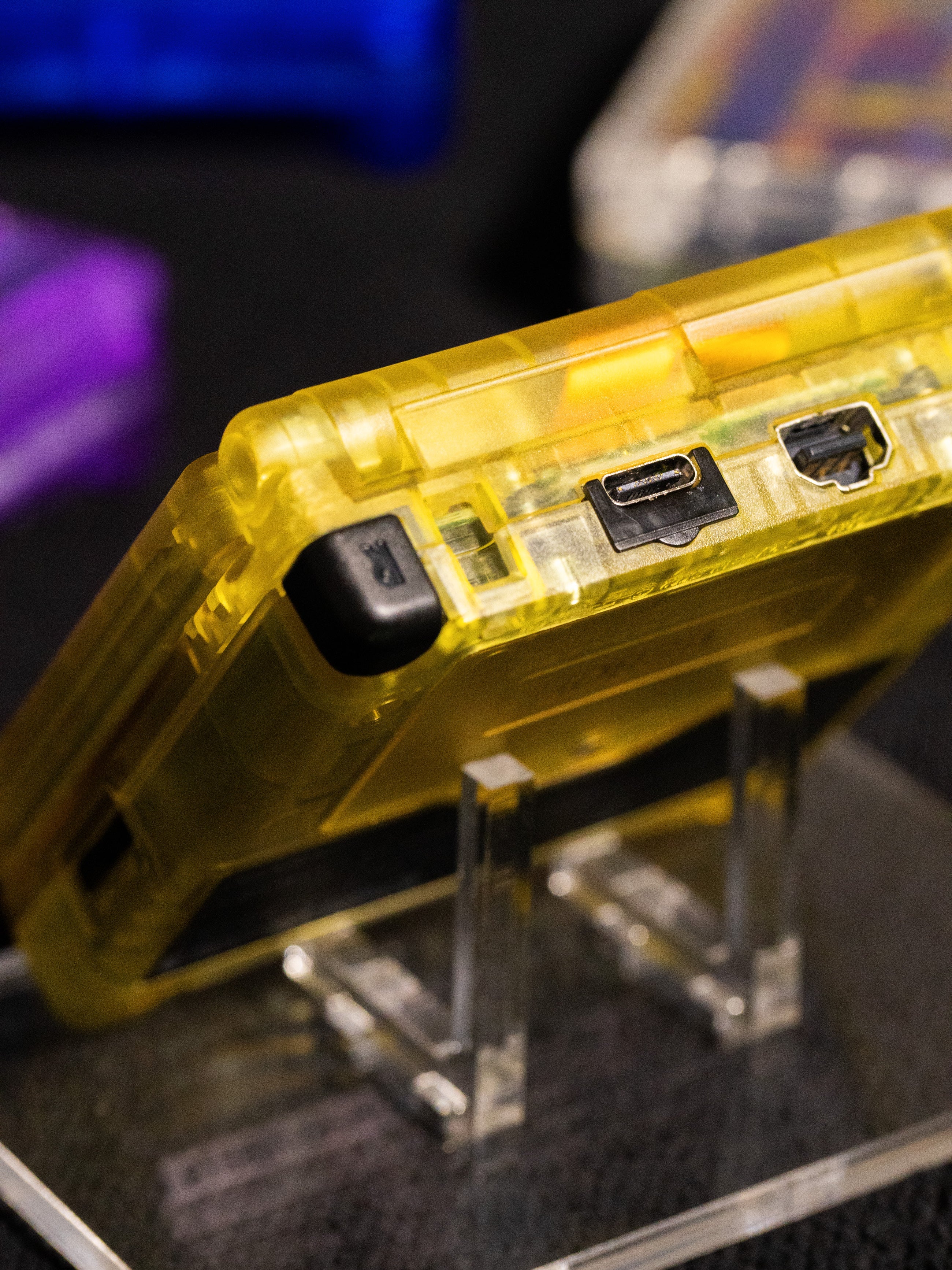 Transparent yellow Raichu Game Boy Advance SP with custom Pichu, Pikachu, and Raichu evolution artwork and IPS V5 backlit screen