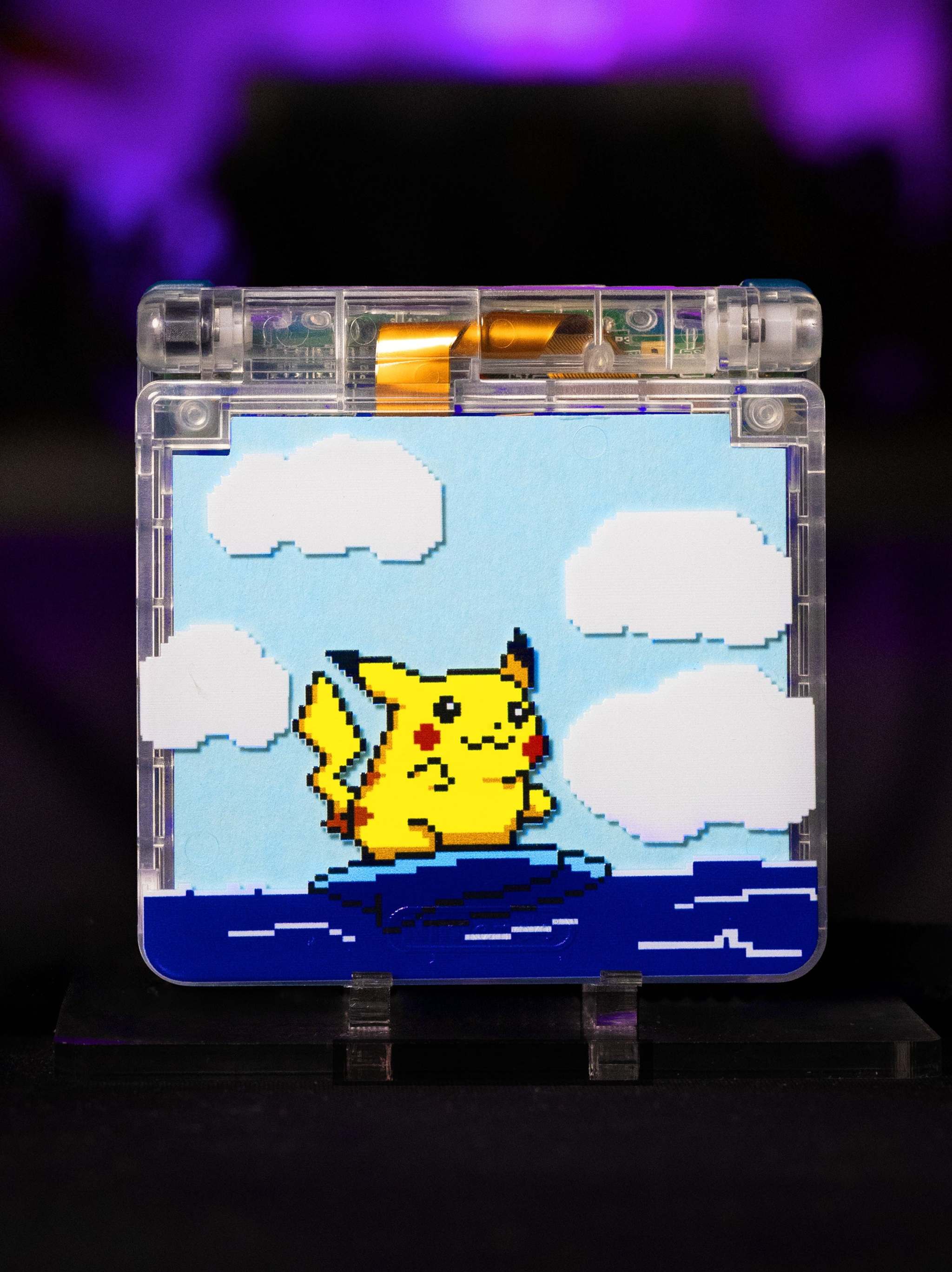 Custom Surfing Pikachu Game Boy Advance SP with transparent shell and IPS V5 display