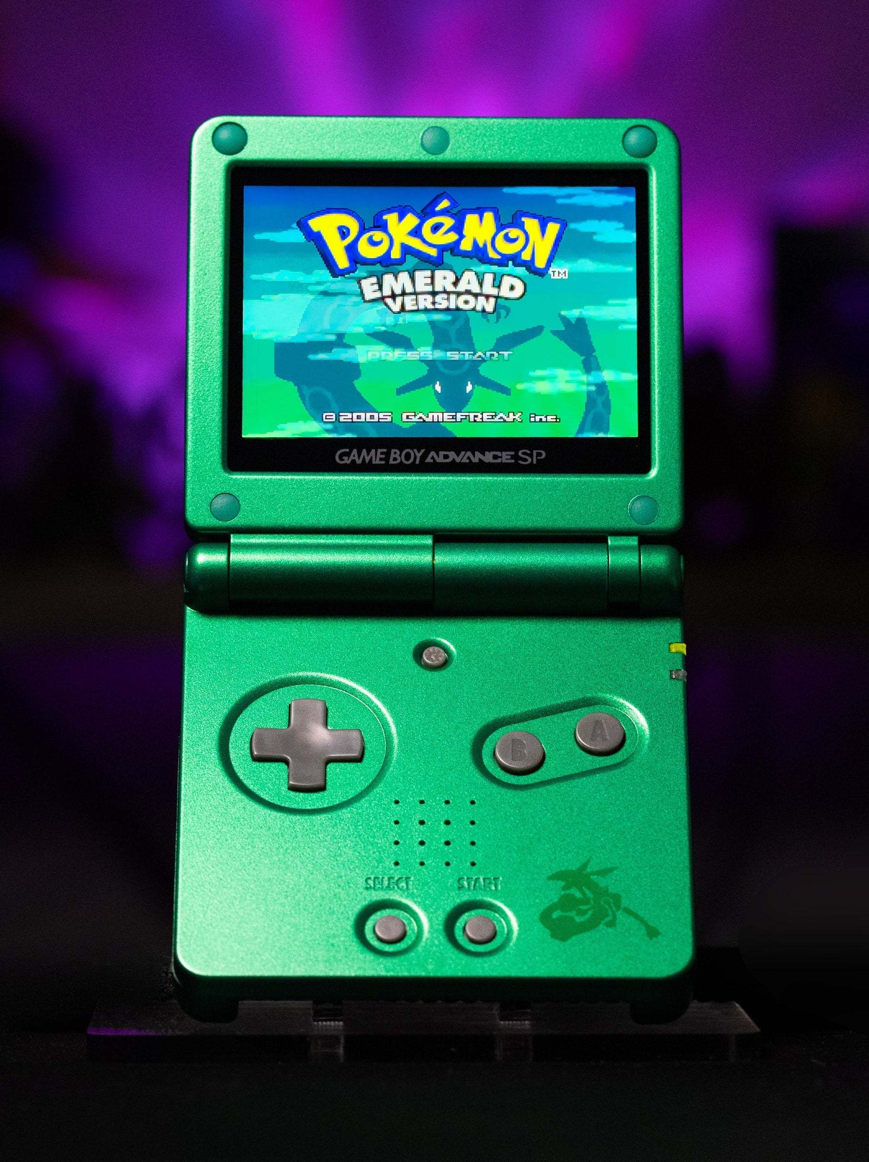 Custom Game Boy Advance SP Rayquaza Edition with IPS V5 backlit display and emerald green shell design