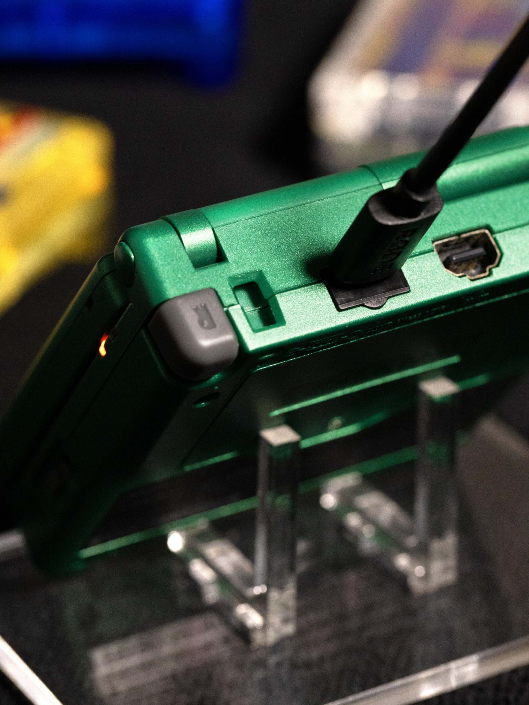 Game Boy Advance SP Rayquaza Edition with emerald green shell and IPS V5 backlit display