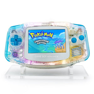 Iridescent pearl Game Boy Advance with blue buttons and white bezel