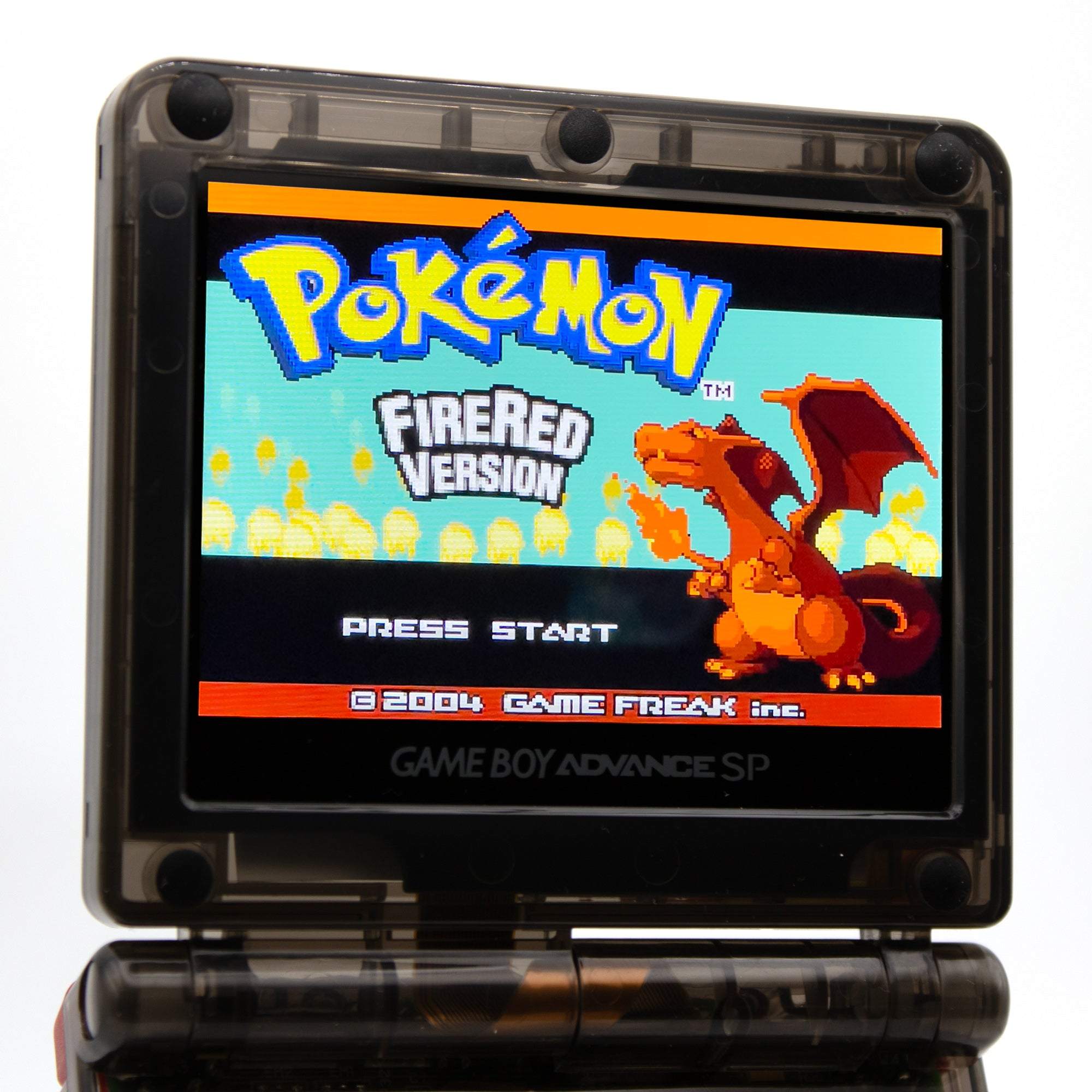 Refurbished Game Boy Advance SP with shiny Charizard evolution artwork