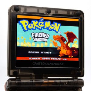 Refurbished Game Boy Advance SP with shiny Charizard evolution artwork