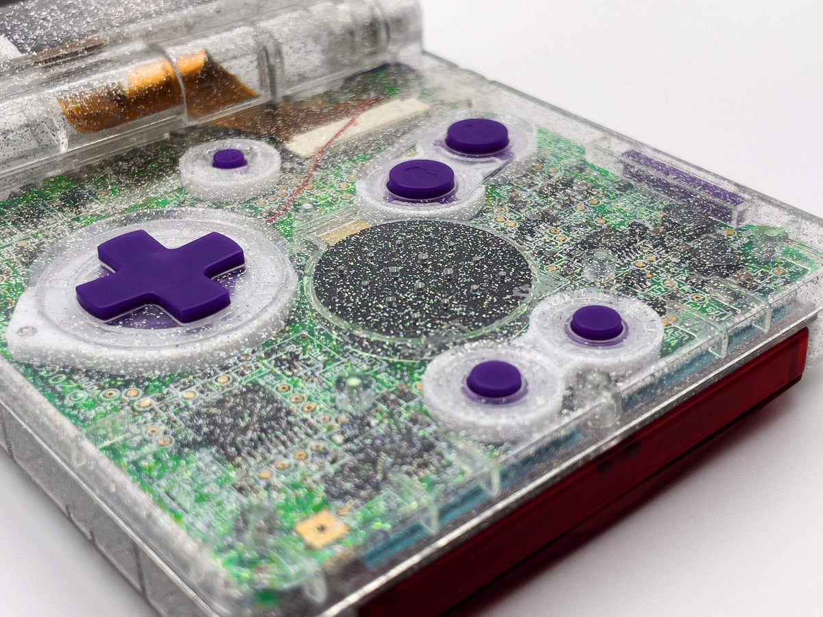 Refurbished Game Boy Advance SP Crystal Clear Glitter Edition with holographic shell and purple buttons