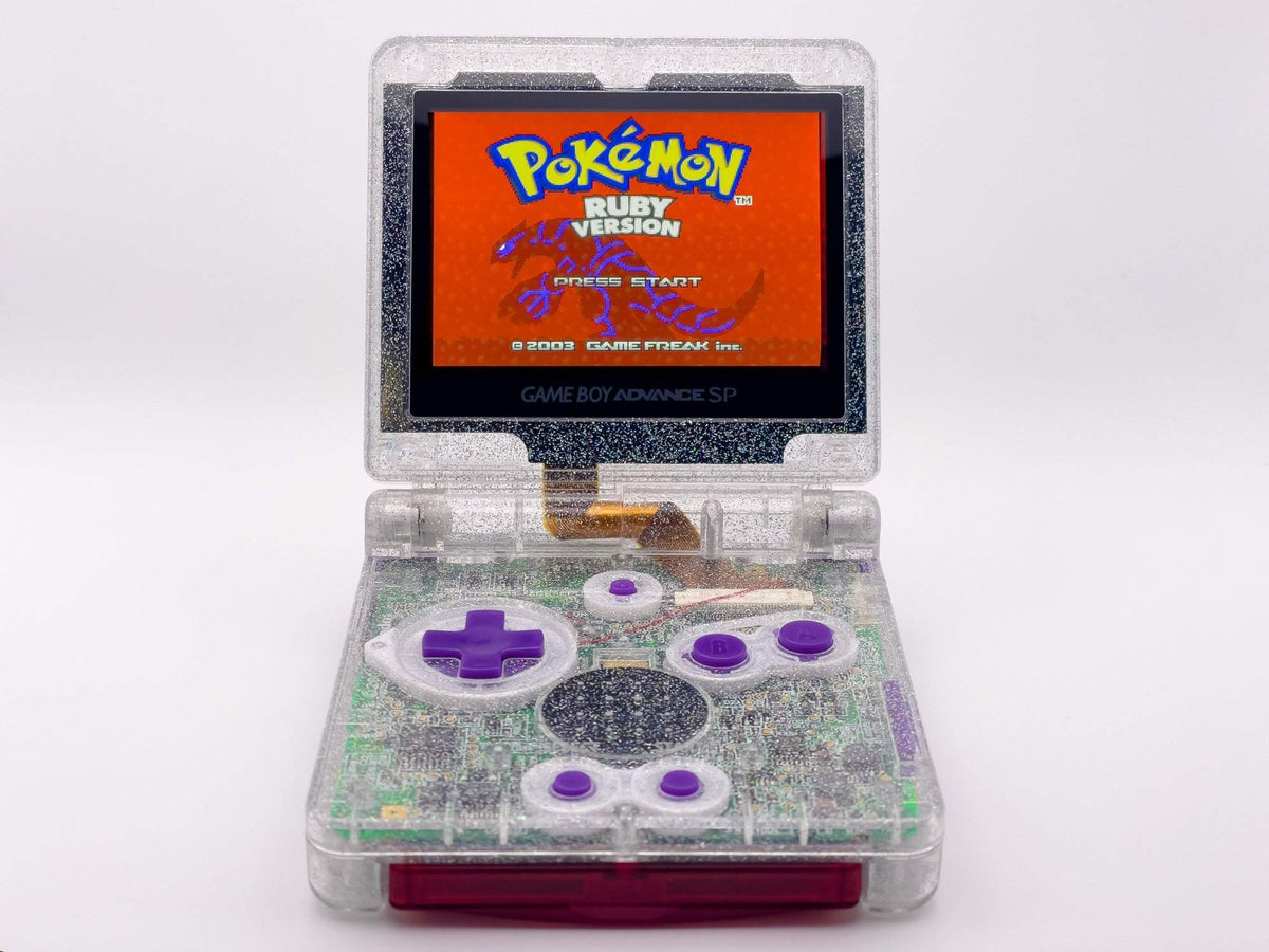 Refurbished Game Boy Advance SP Crystal Clear Glitter Edition with holographic shell and purple buttons