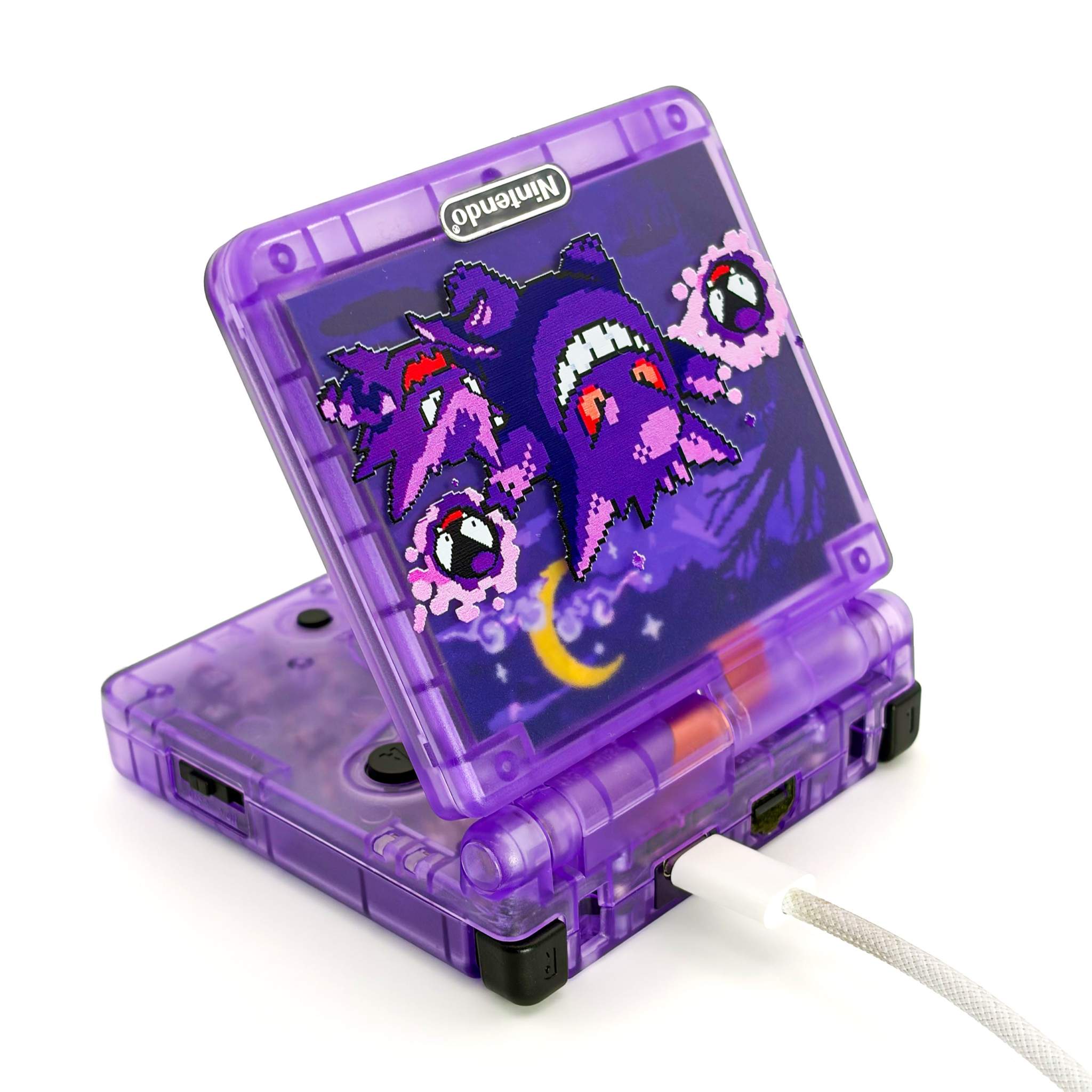 Game Boy Advance SP Gengar Evolution Edition with purple transparent shell