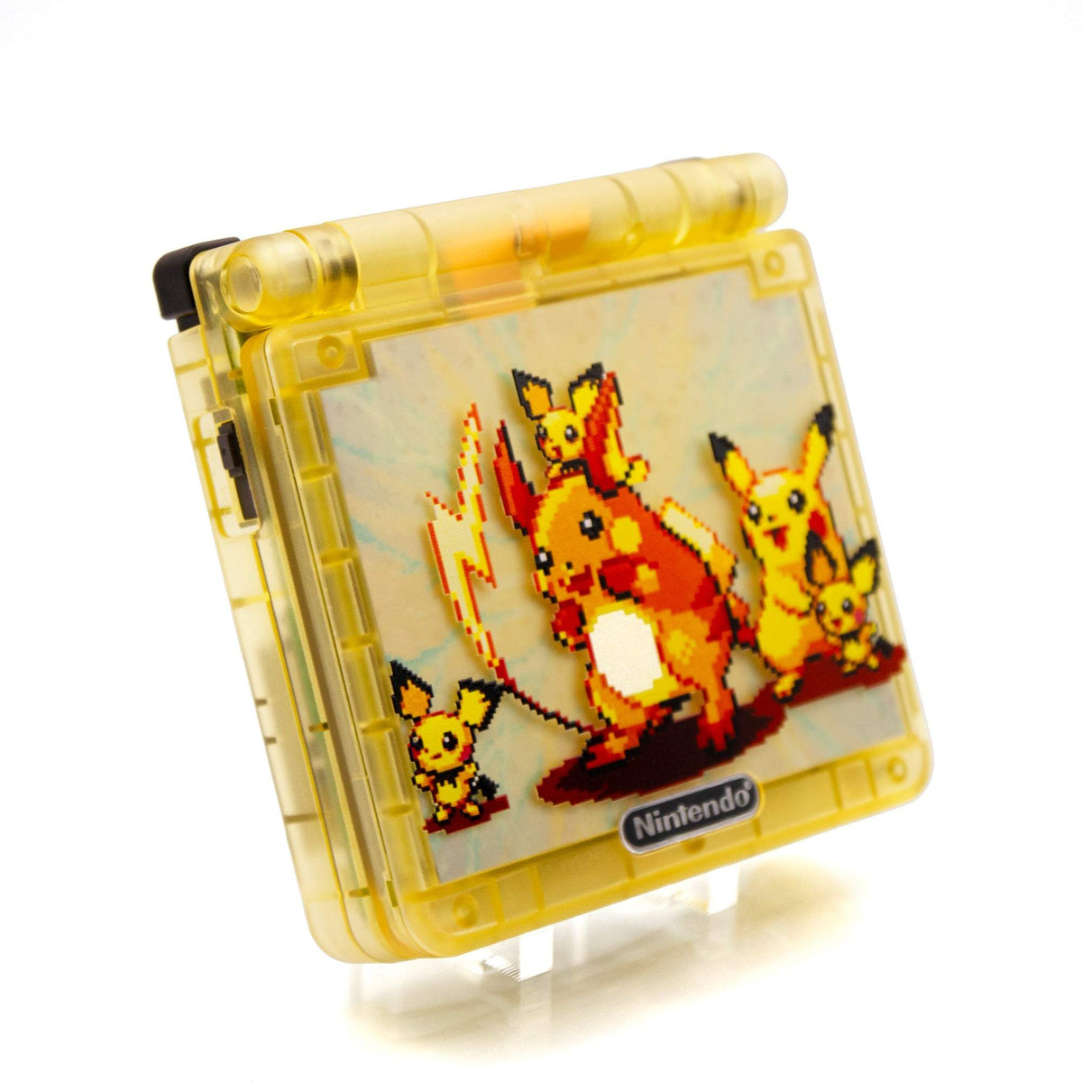 Game Boy Advance SP Raichu Evolution Edition with vibrant yellow shell and evolution artwork