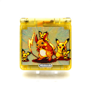 Raichu edition Game Boy Advance SP with transparent yellow shell and evolution artwork