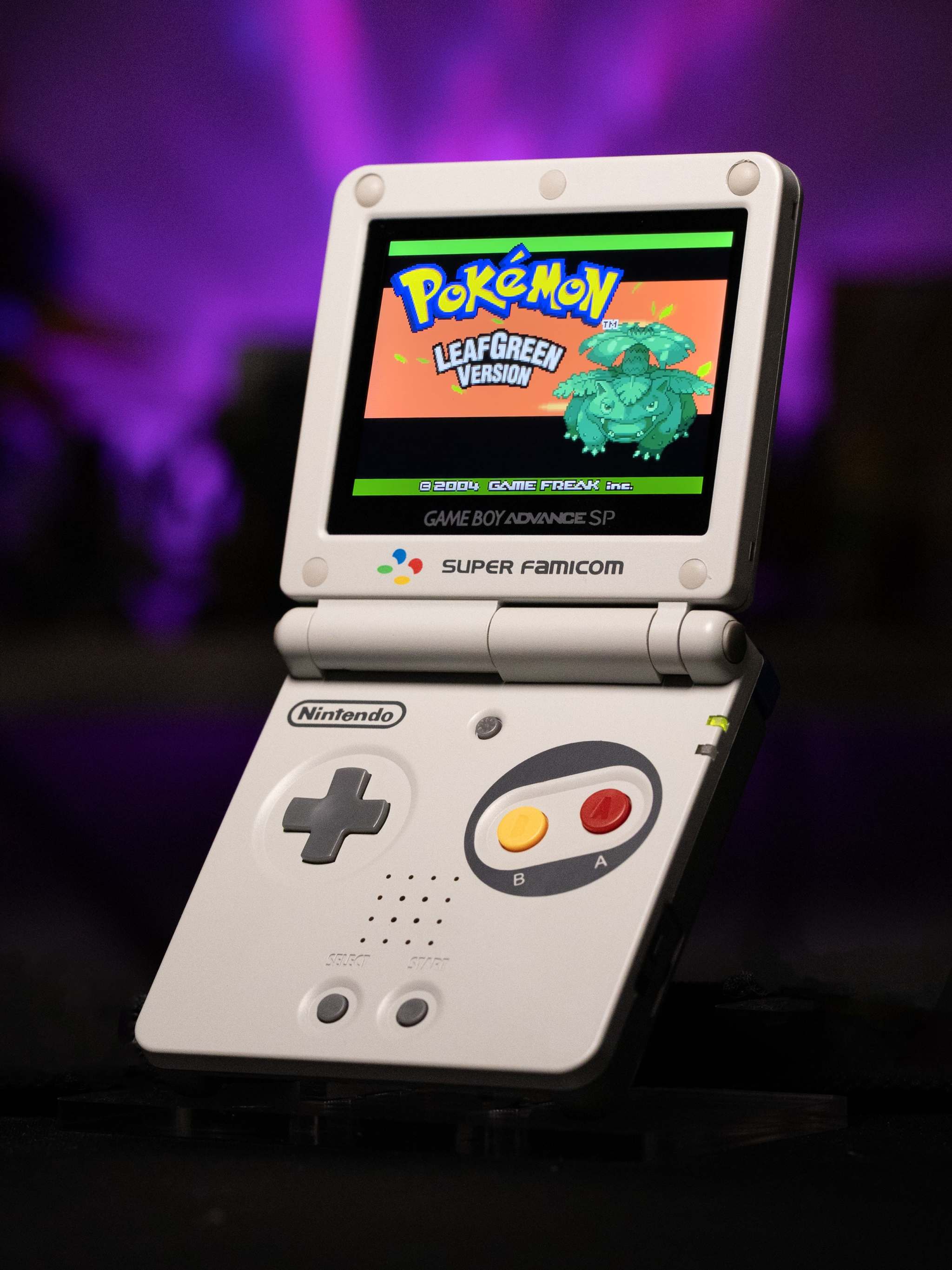Gameboy Advance SP Super Famicom Edition with grey shell and colored buttons on IPS V5 display