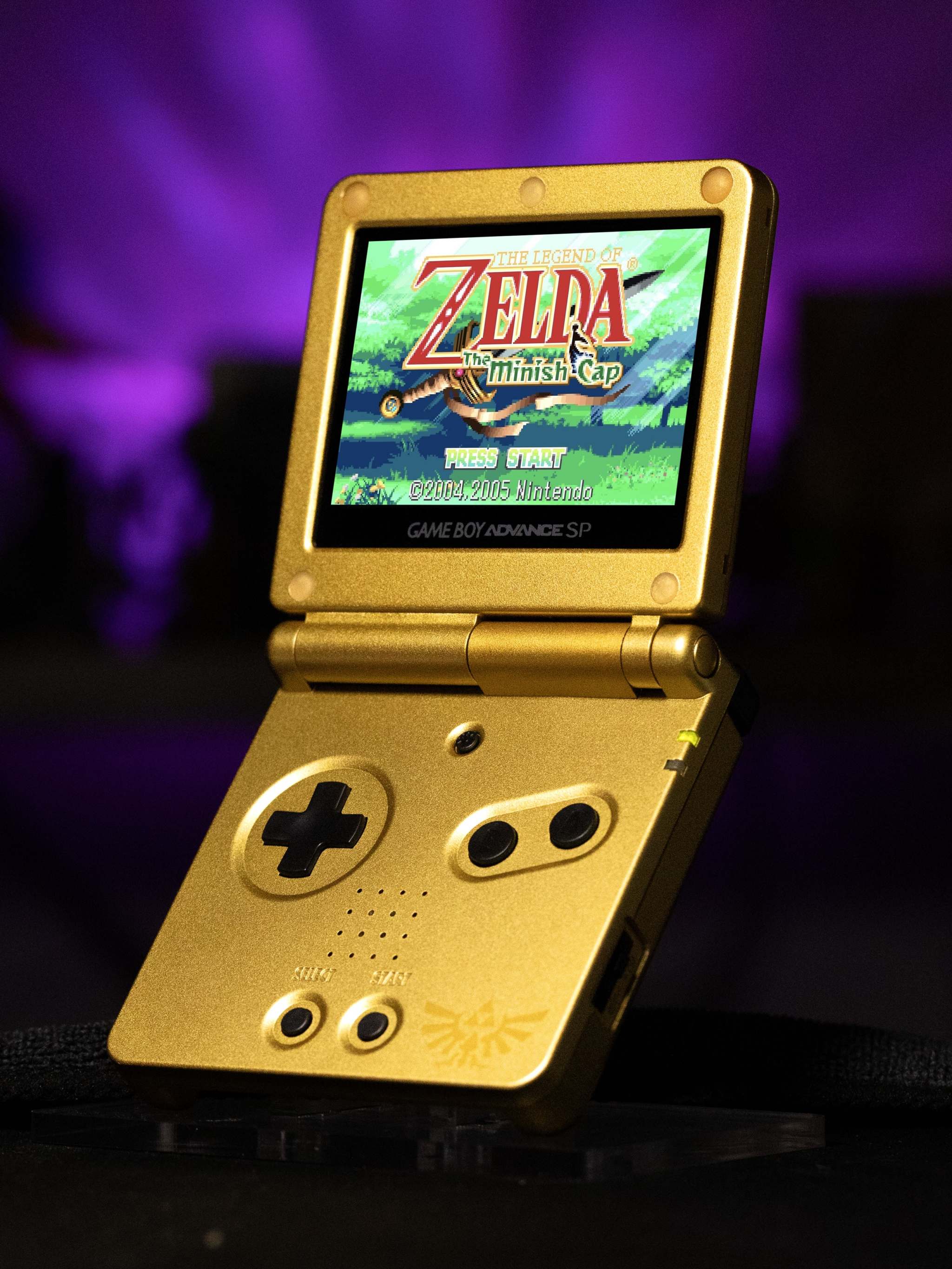 Refurbished Game Boy Advance SP Zelda Triforce Edition with gold shell and IPS V5 backlit screen