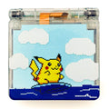 Game Boy Advance SP Surfing Pikachu Edition with transparent shell and pixel art